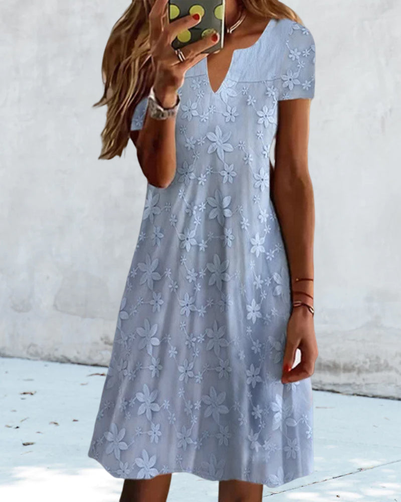 Elegant spetsblommig kortärmad klänning