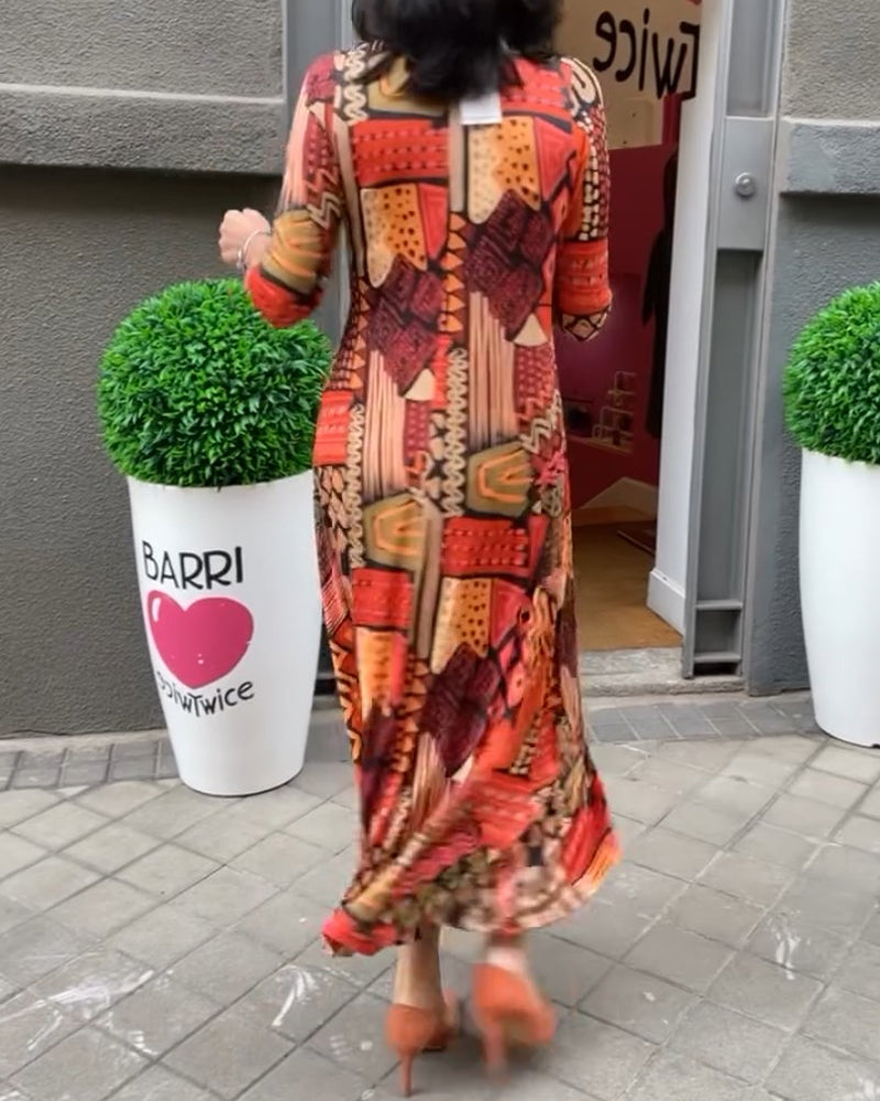 Halvärmad klänning med V-ringning och tryck