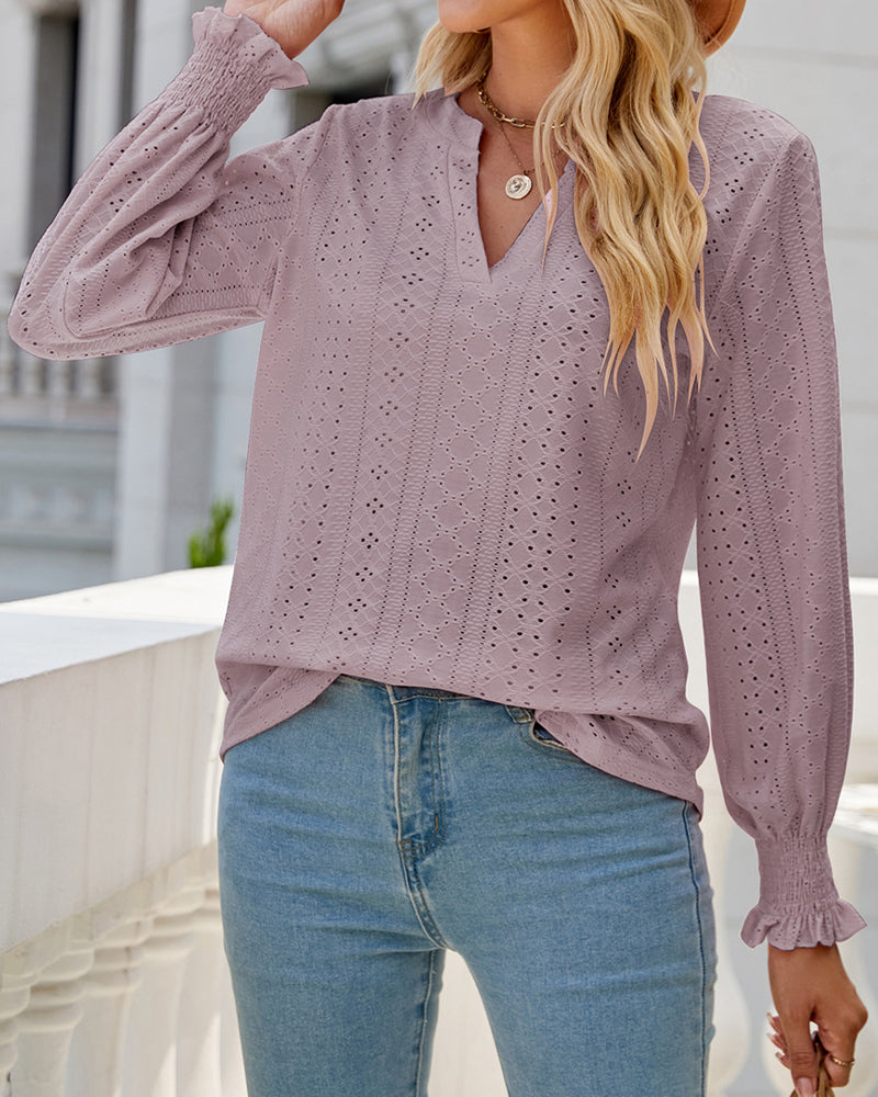 Blus med v-hals och volangärmar