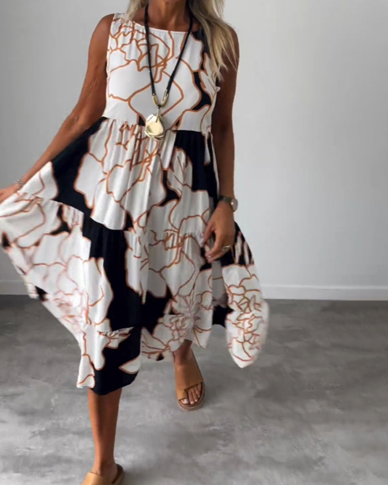 Klänning med ärmar och blommönster