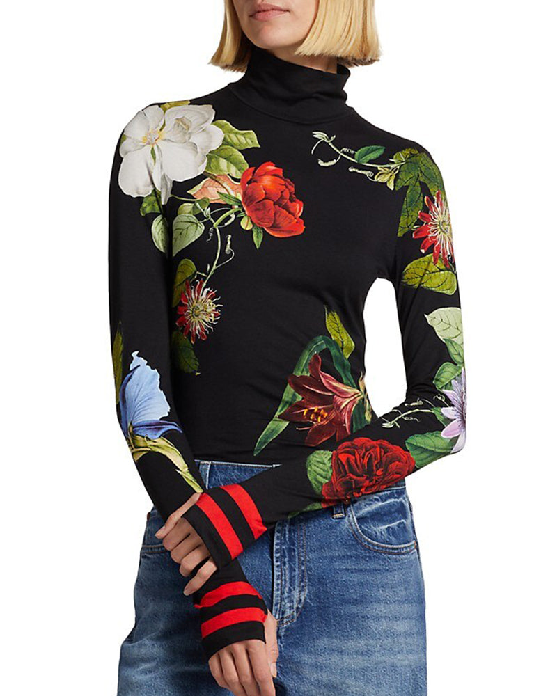 Elegant topp med turtleneck och blommönster