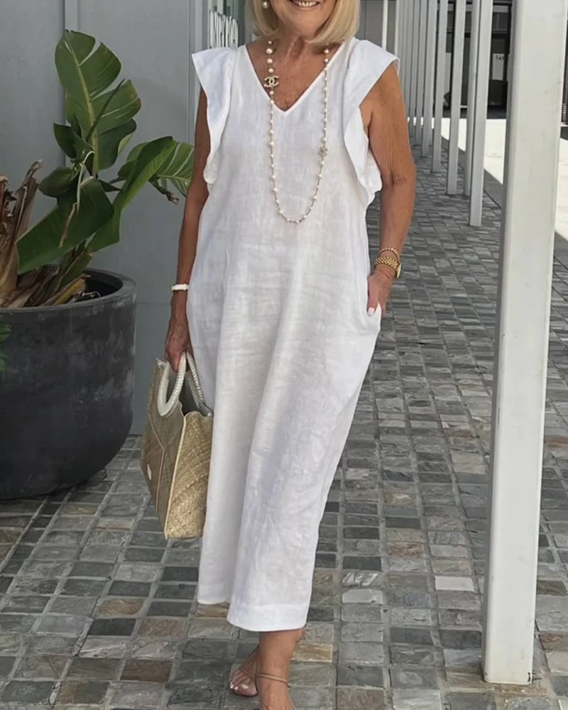 Klänning med konstnärlig touch och ärmlös