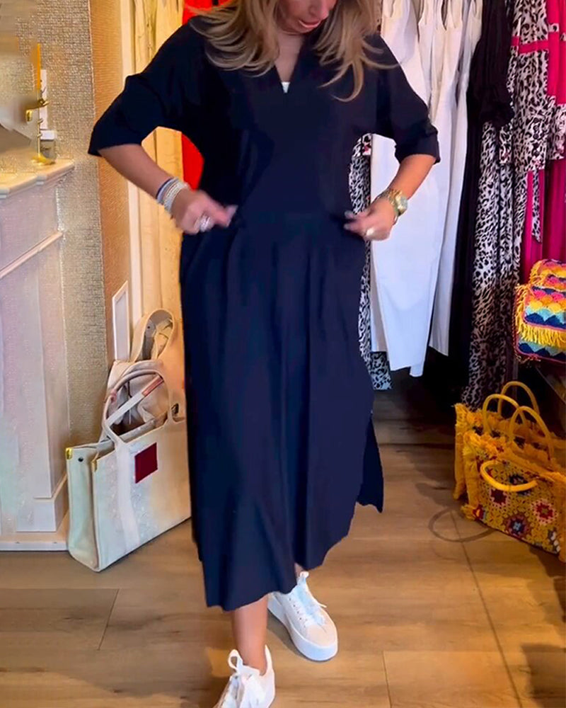 Fickklänning med v-ringning