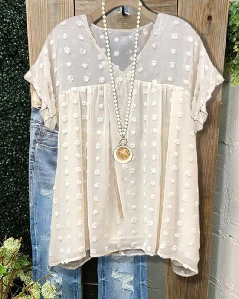 V-ringad enfärgad topp