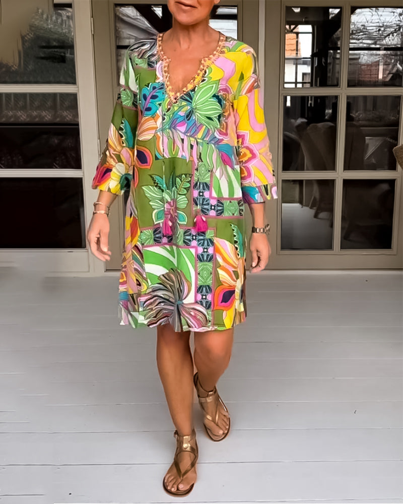 Fritidsklänning med blom- och grästryck