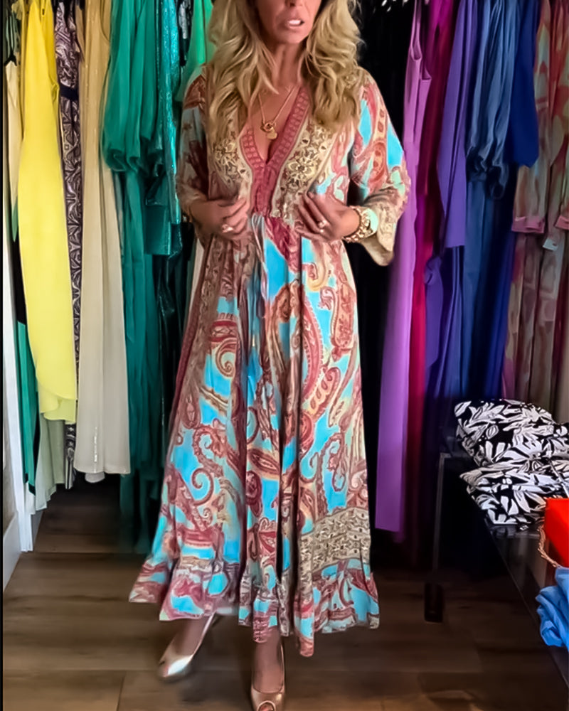 Långärmad lång klänning med modetryck