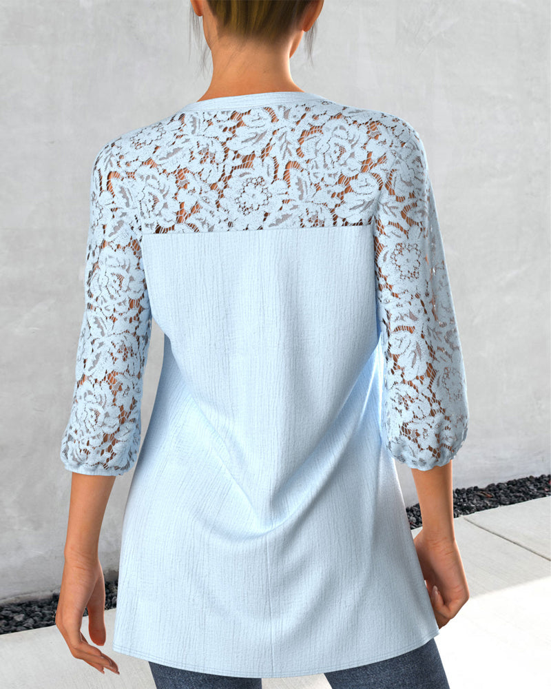 Blus med instickssöm och delad hals