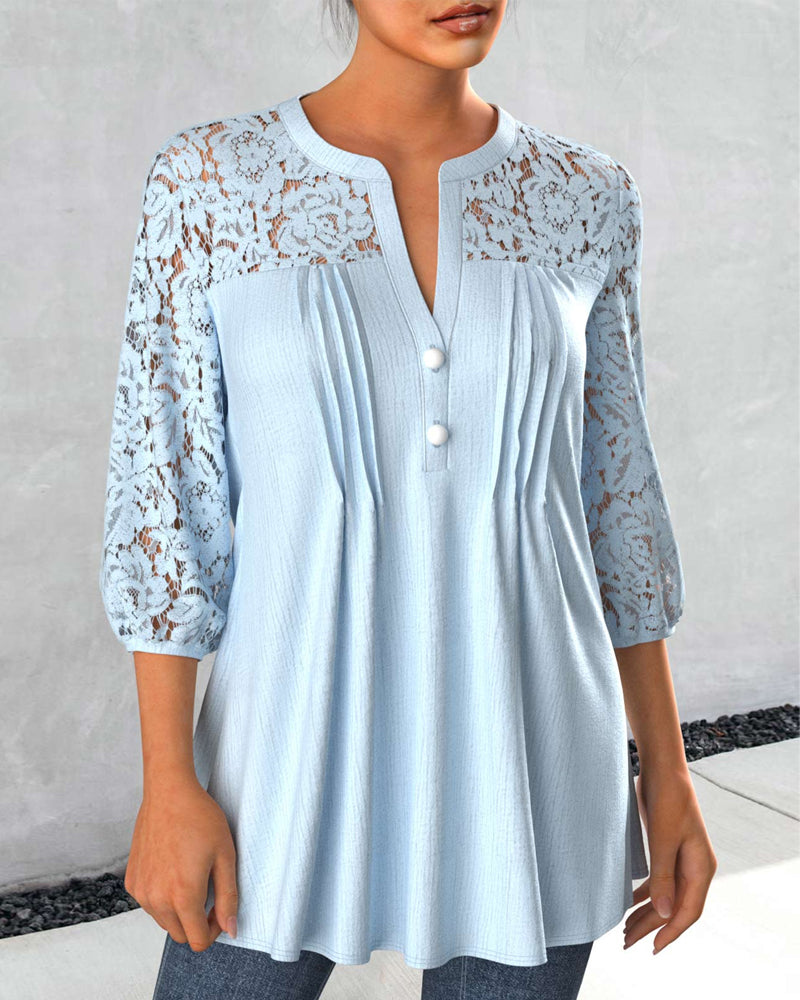 Blus med instickssöm och delad hals