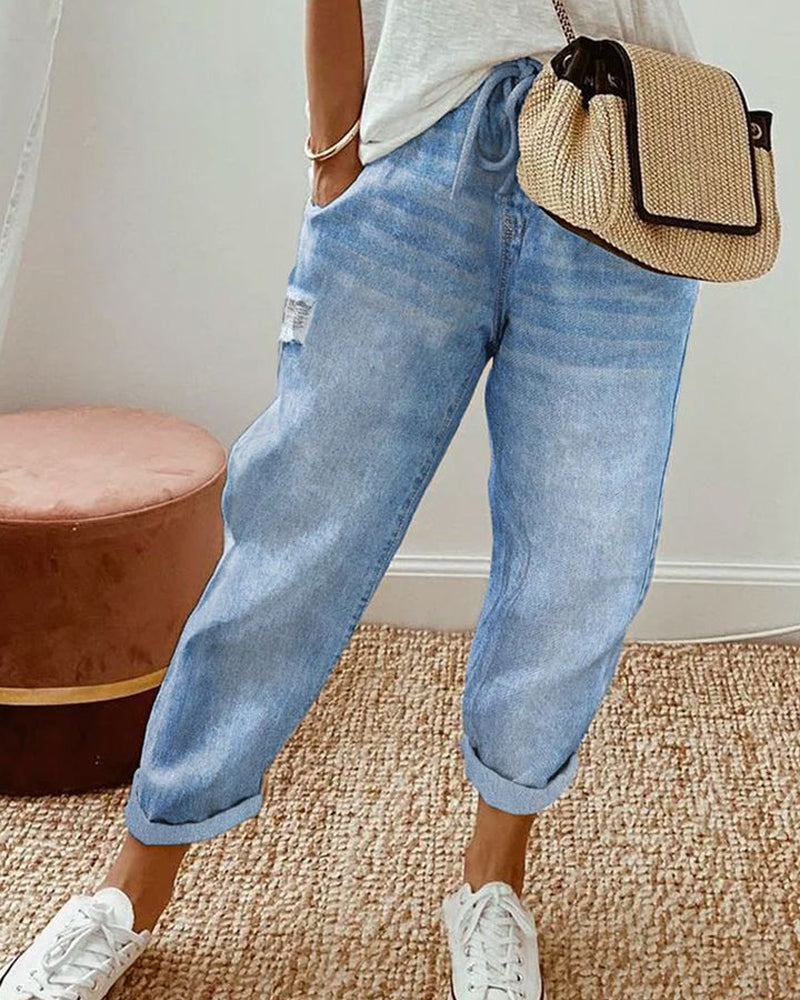 Avslappnad jeans med fickor