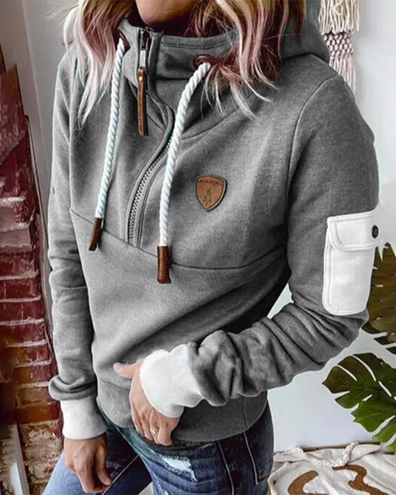 Avslappnad hoodie med halv dragkedja