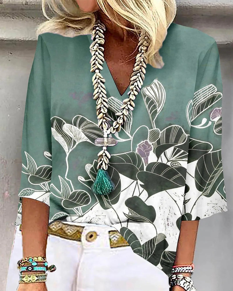 Tryckt V-ringad blus med 3/4 ärmar