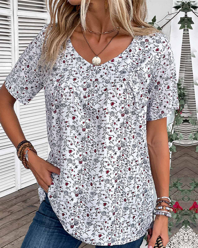 Volang blus med blommönster