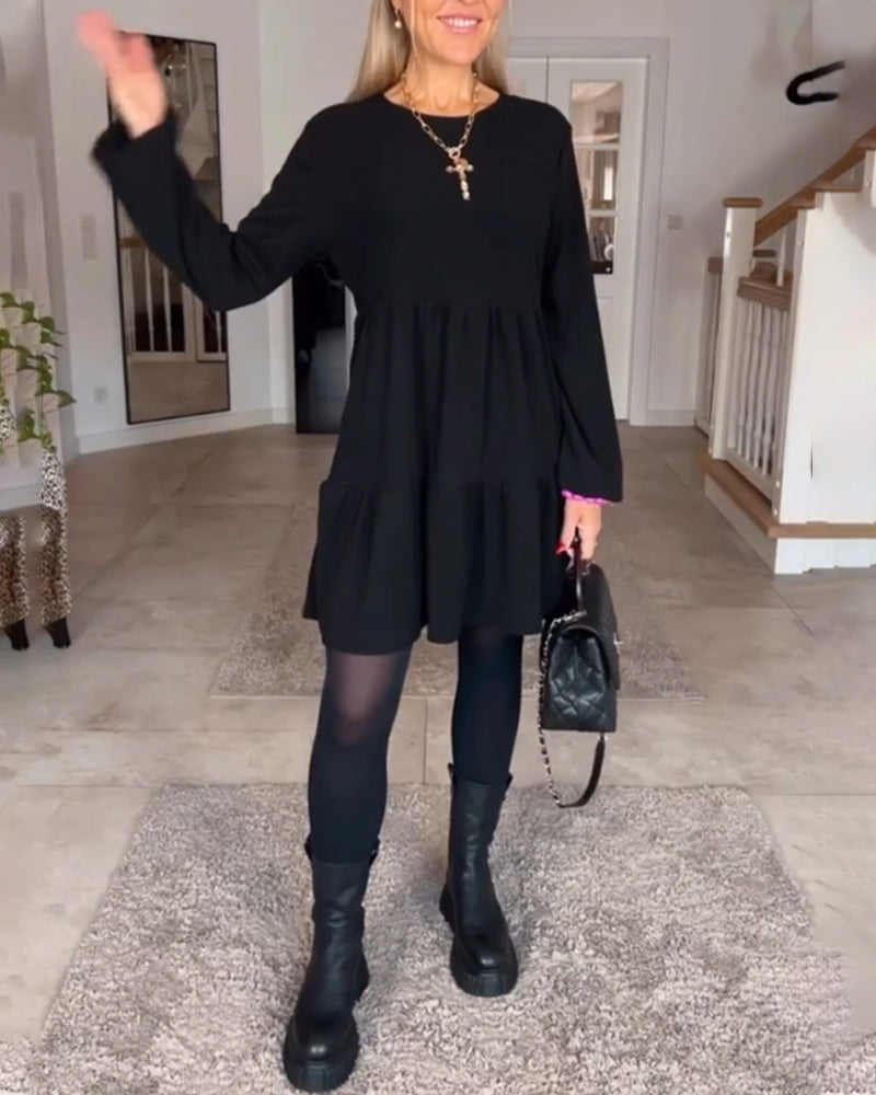 Enkel enfärgad långärmad klänning