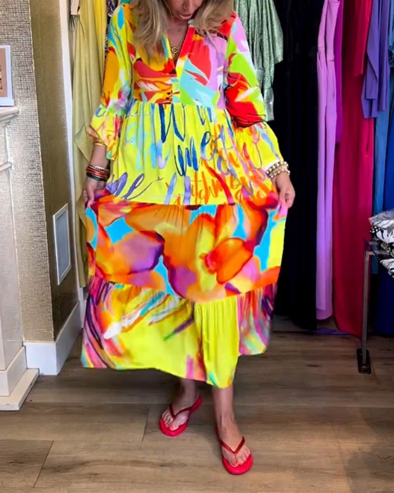 Klänning med utsvängd ärm och tryck