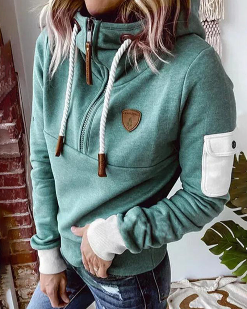 Avslappnad hoodie med halv dragkedja