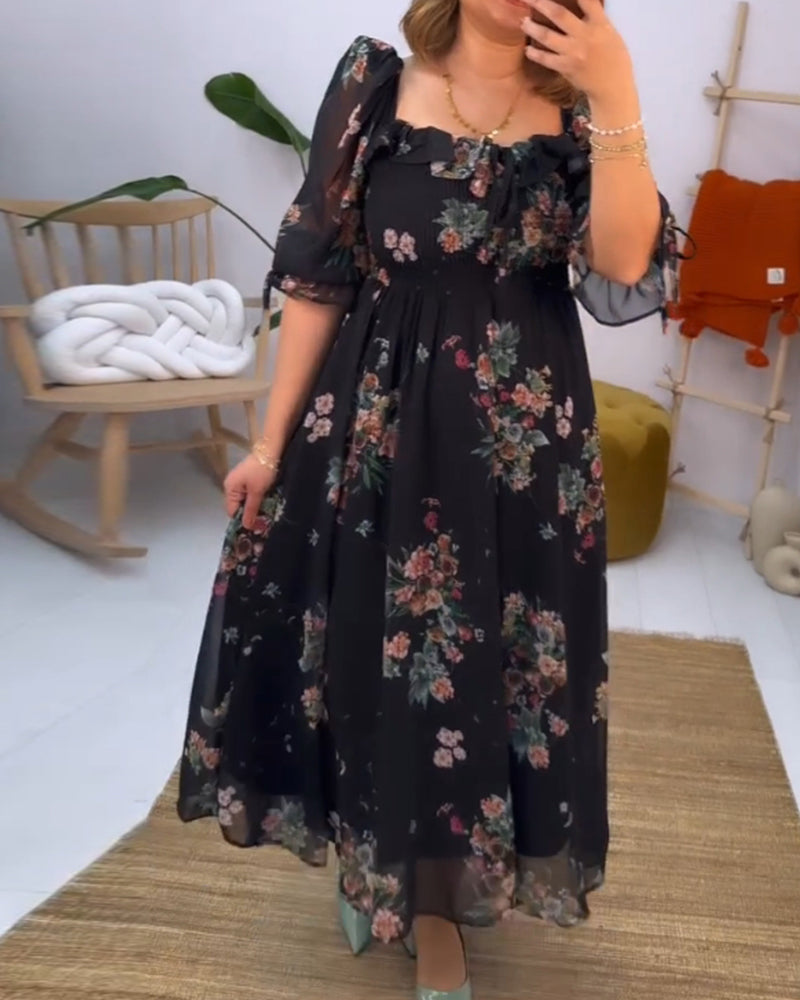 Blommig elegant klänning med fyrkantig hals