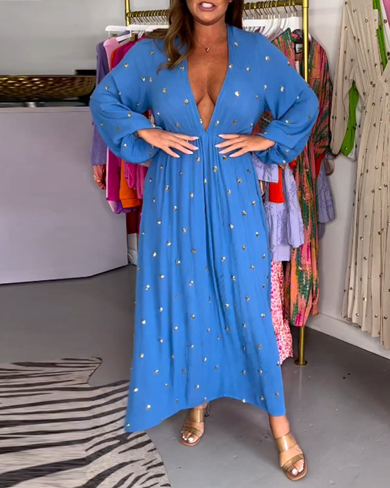 Sexig klänning med djup v-ringning