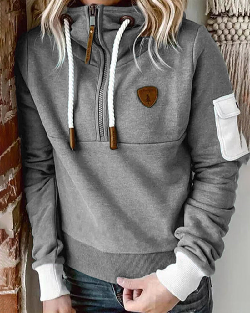 Avslappnad hoodie med halv dragkedja