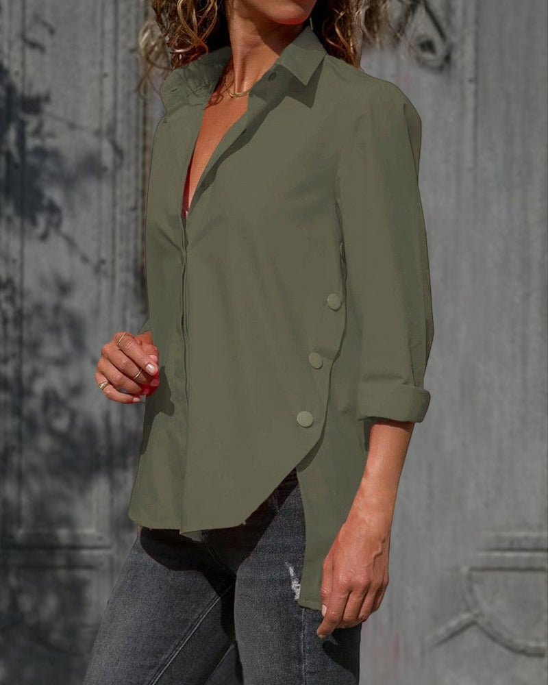 Långärmad oversized skjorta med oregelbunden slits