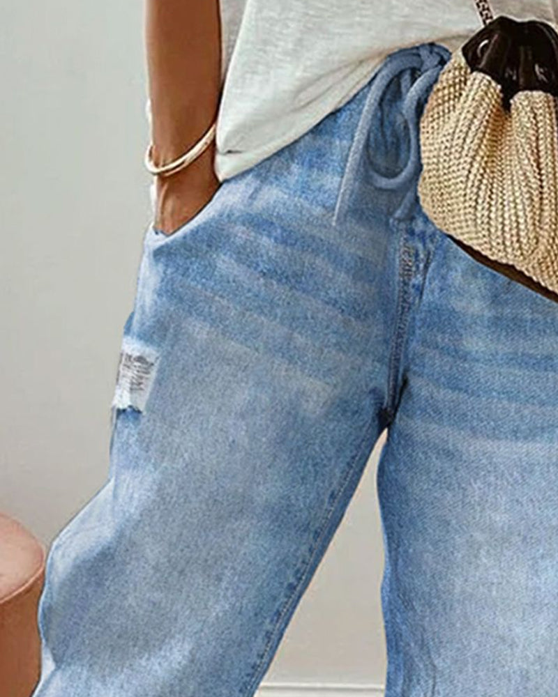 Avslappnad jeans med fickor