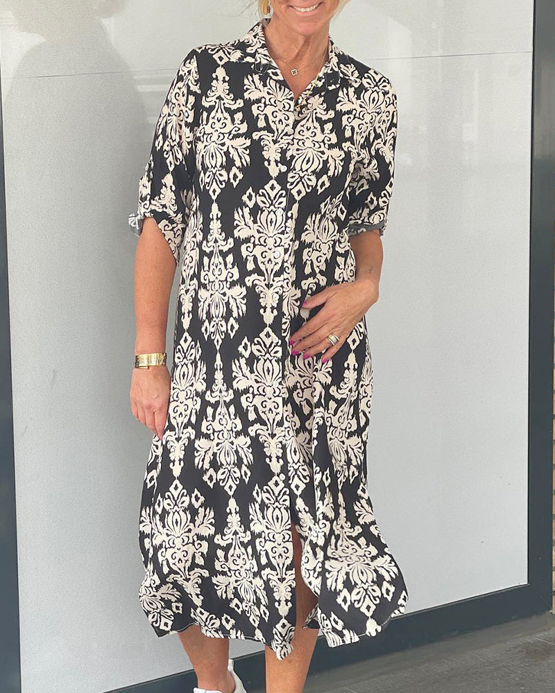 Slitsklänning med blommönster