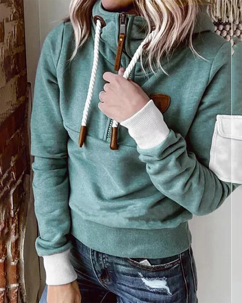 Avslappnad hoodie med halv dragkedja