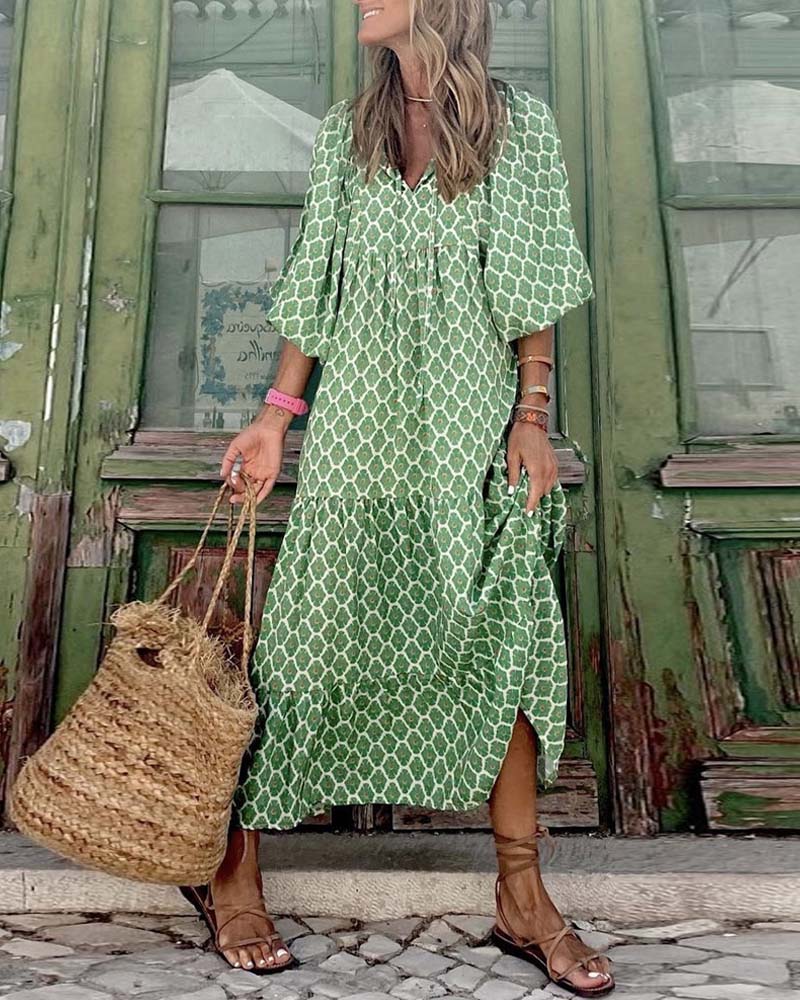 Puffärmklänning med geometriskt tryck