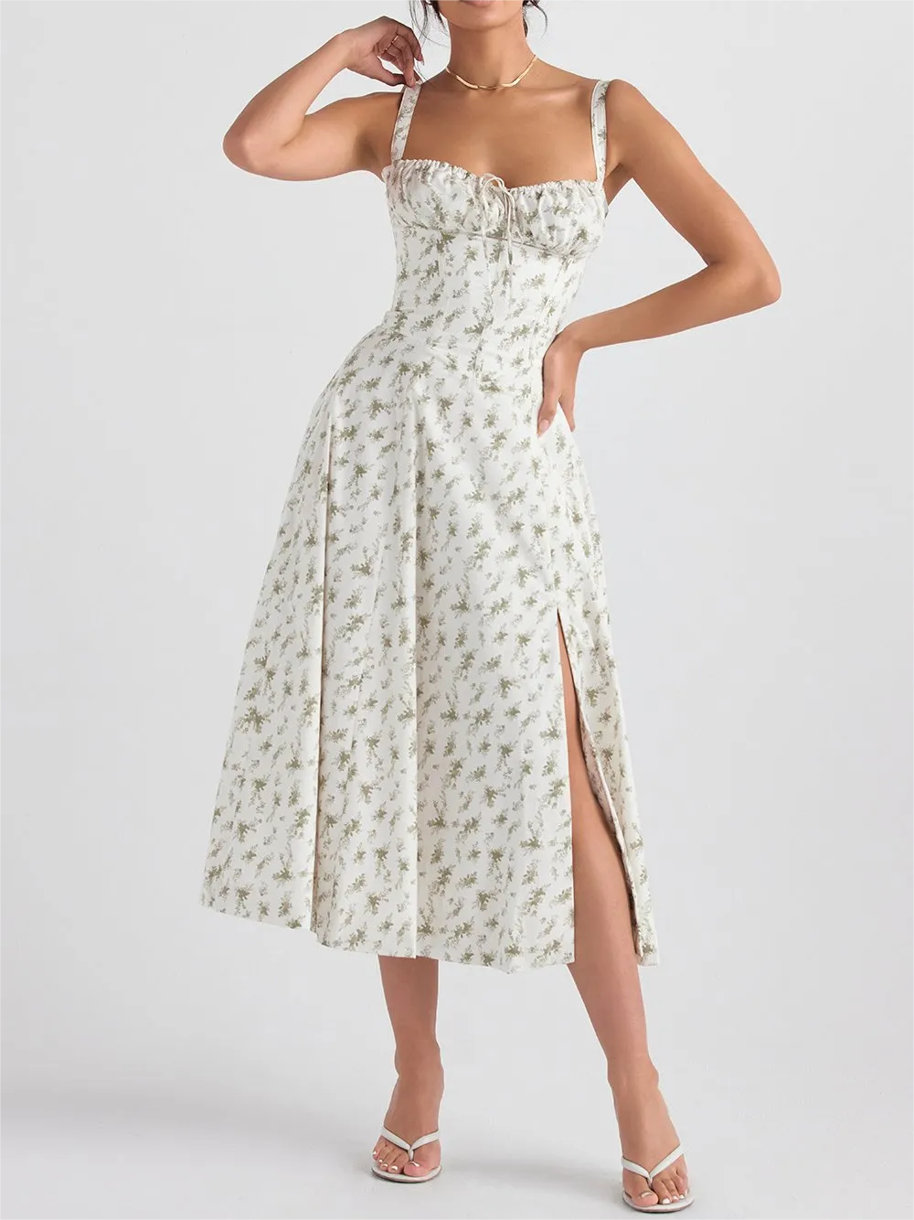 Blommig klänning med bustier som formar midjan