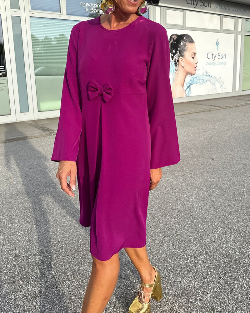 Rosettklänning med rund hals