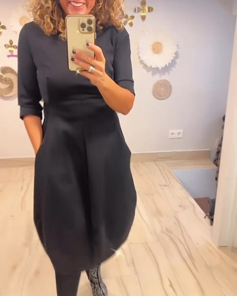 Enfärgad klänning med ficka