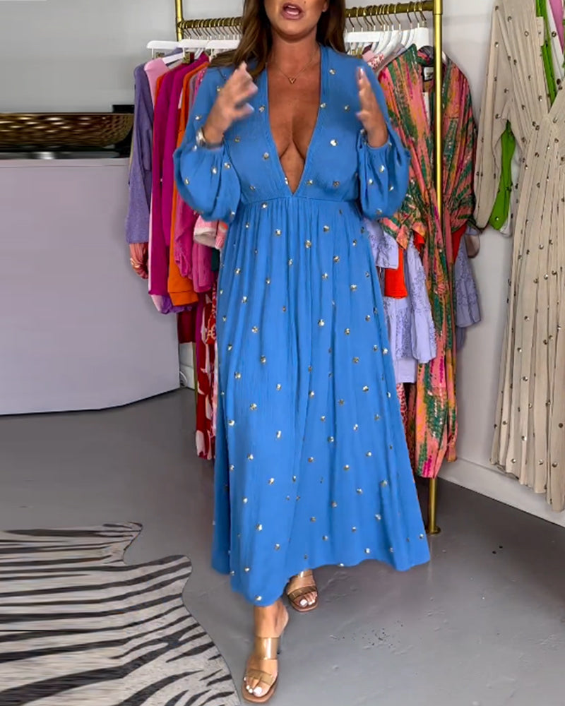 Sexig klänning med djup v-ringning