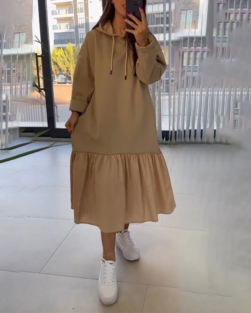 Långärmad Klänning Med Fickor