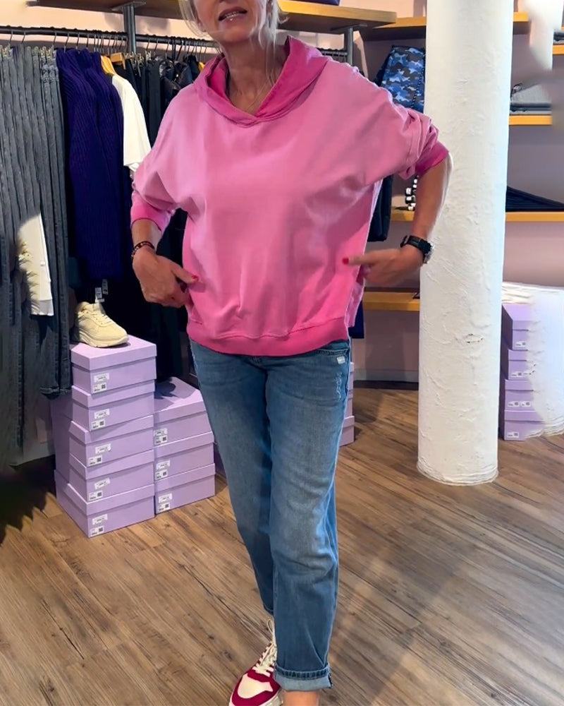 Avslappnad luvtröja med lutning