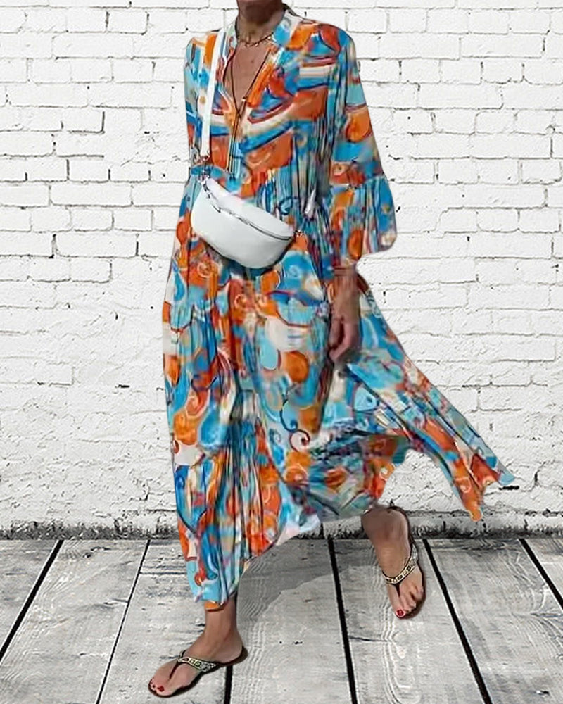 Klänning med volang ärm och v-ringning