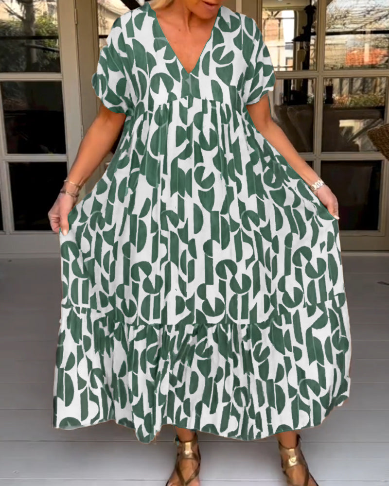 Kortärmad klänning med v-ringning