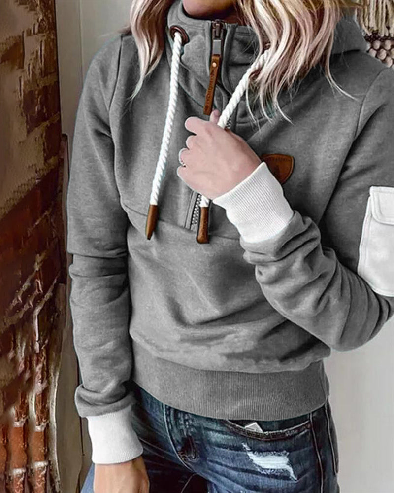 Avslappnad hoodie med halv dragkedja