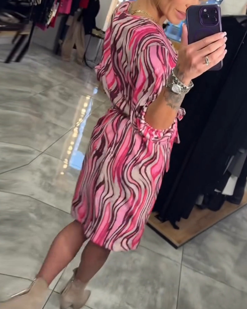 Klänning med färgglatt tryck och knälång