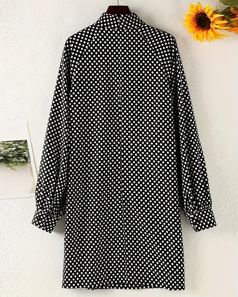 Elegant tryckt klänning med lösa ärmar