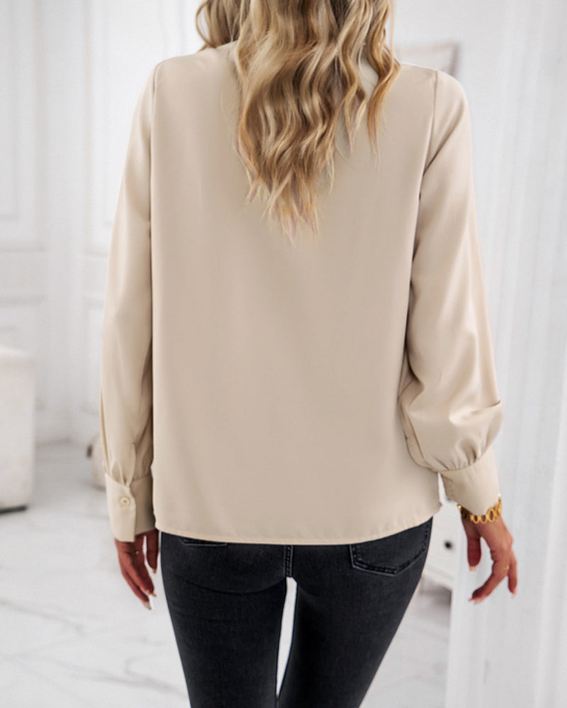 Elegant blus med volanger