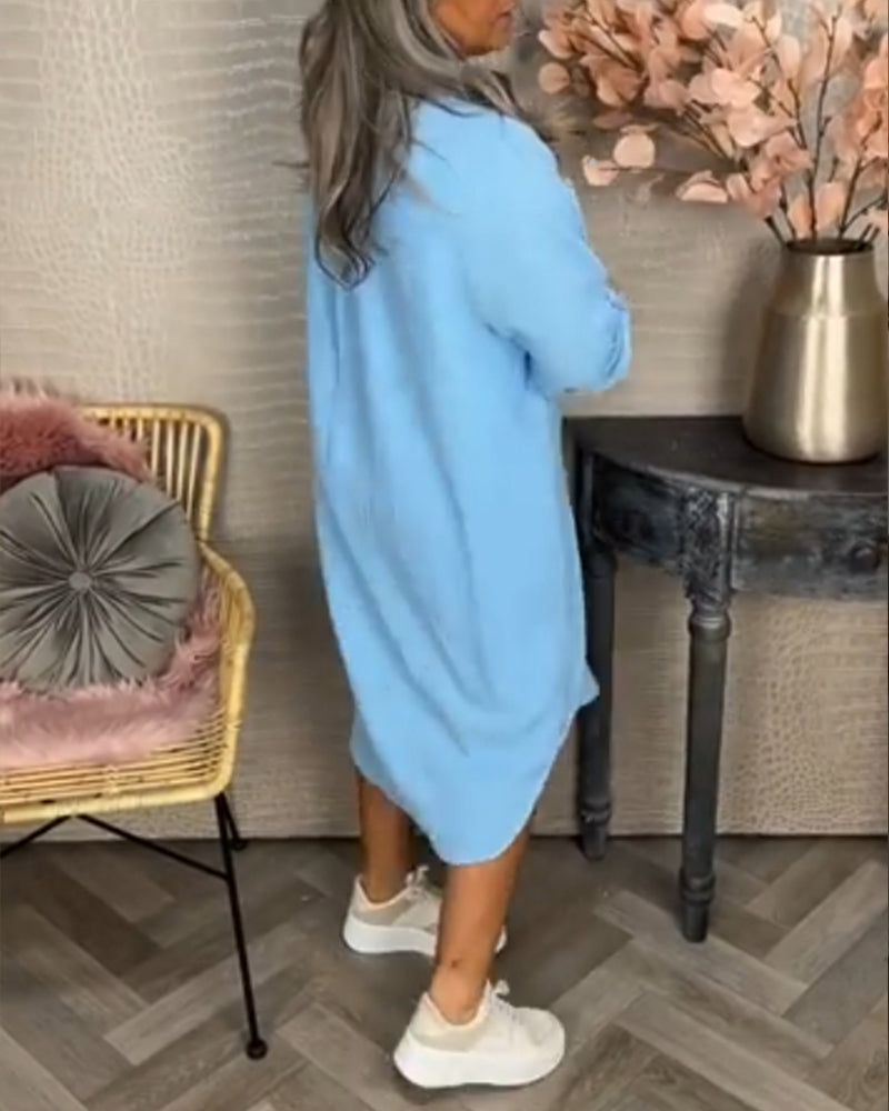 Klänning med fickor och knappar