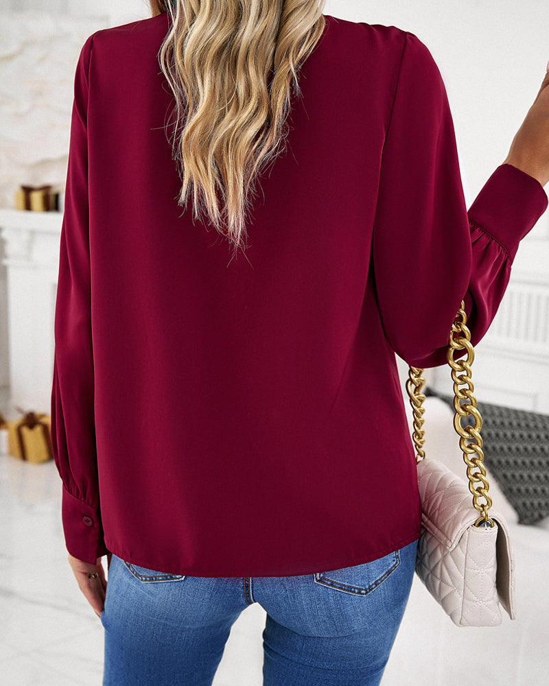 Elegant blus med volanger
