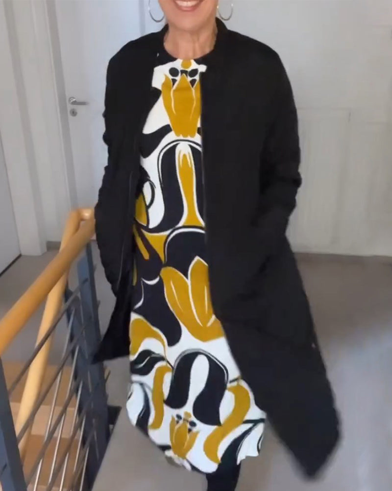 Klänning med tryck och rund halsringning