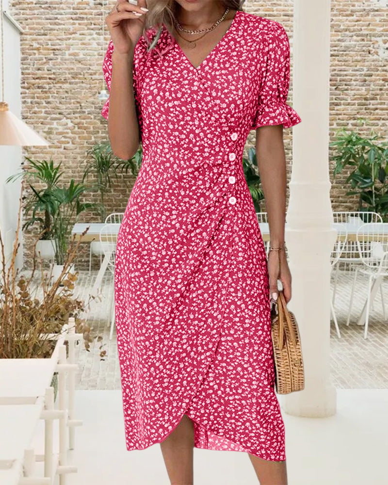 Klänning i blommönster med kort ärm