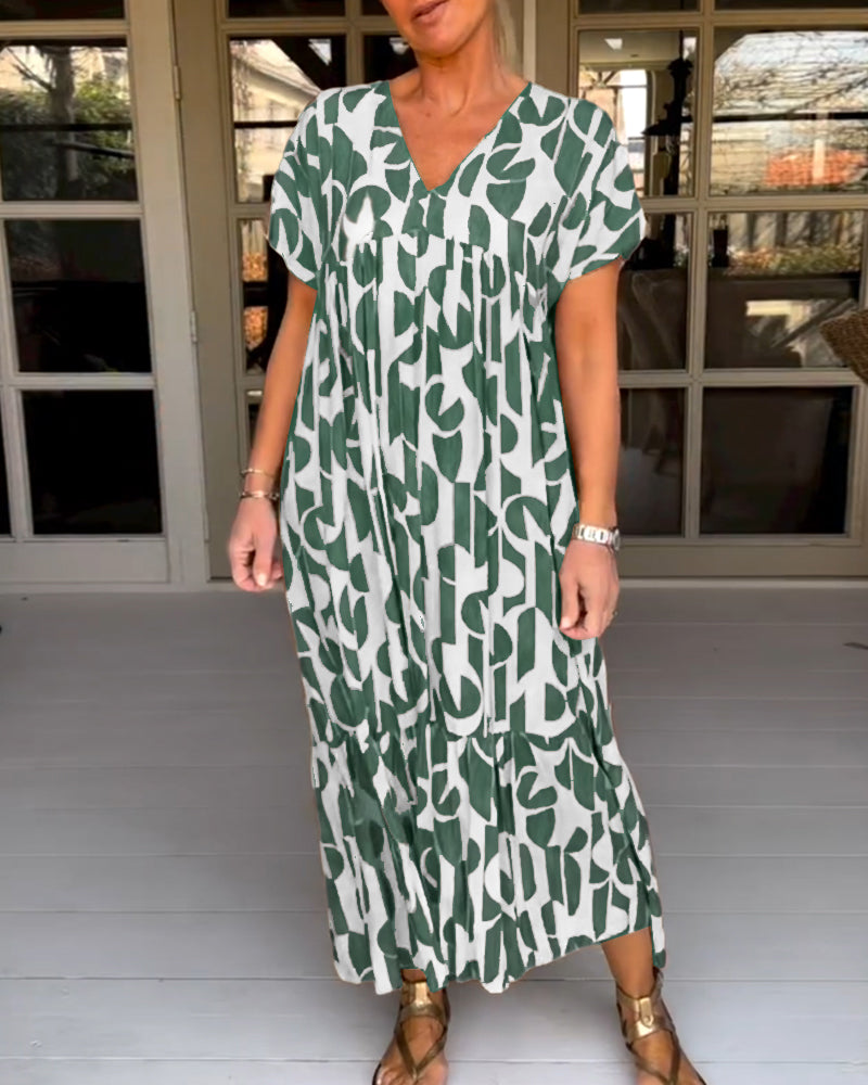 Kortärmad klänning med v-ringning