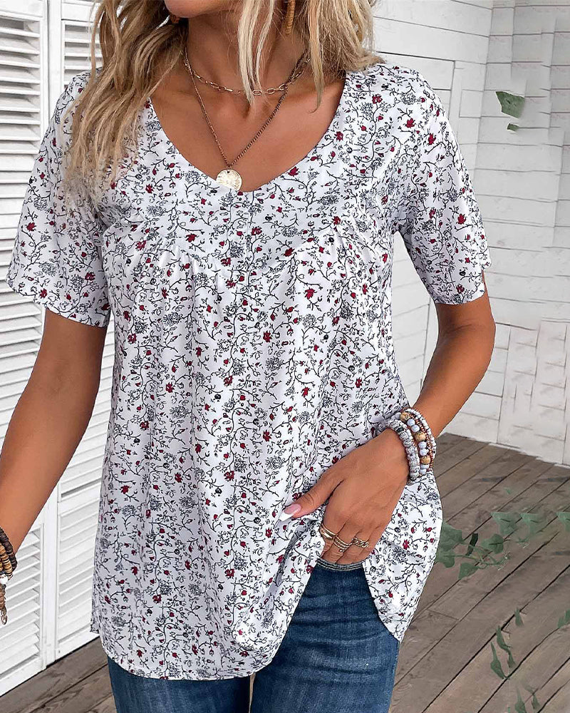 Volang blus med blommönster