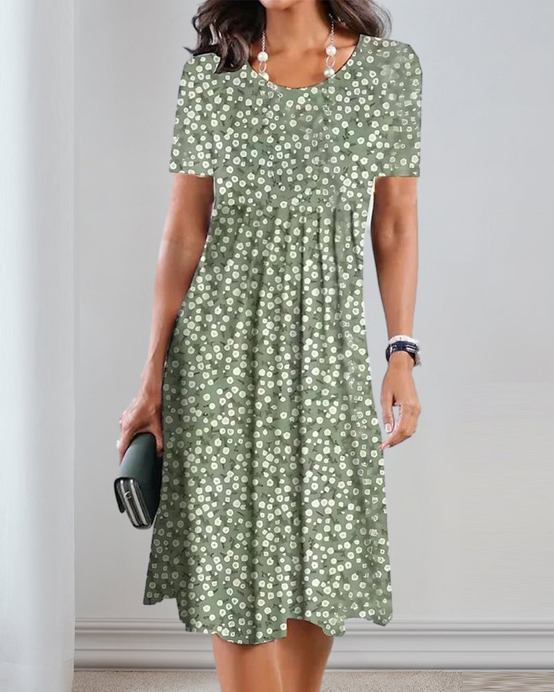 Knälång klänning med blommönster