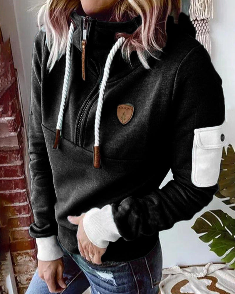 Avslappnad hoodie med halv dragkedja