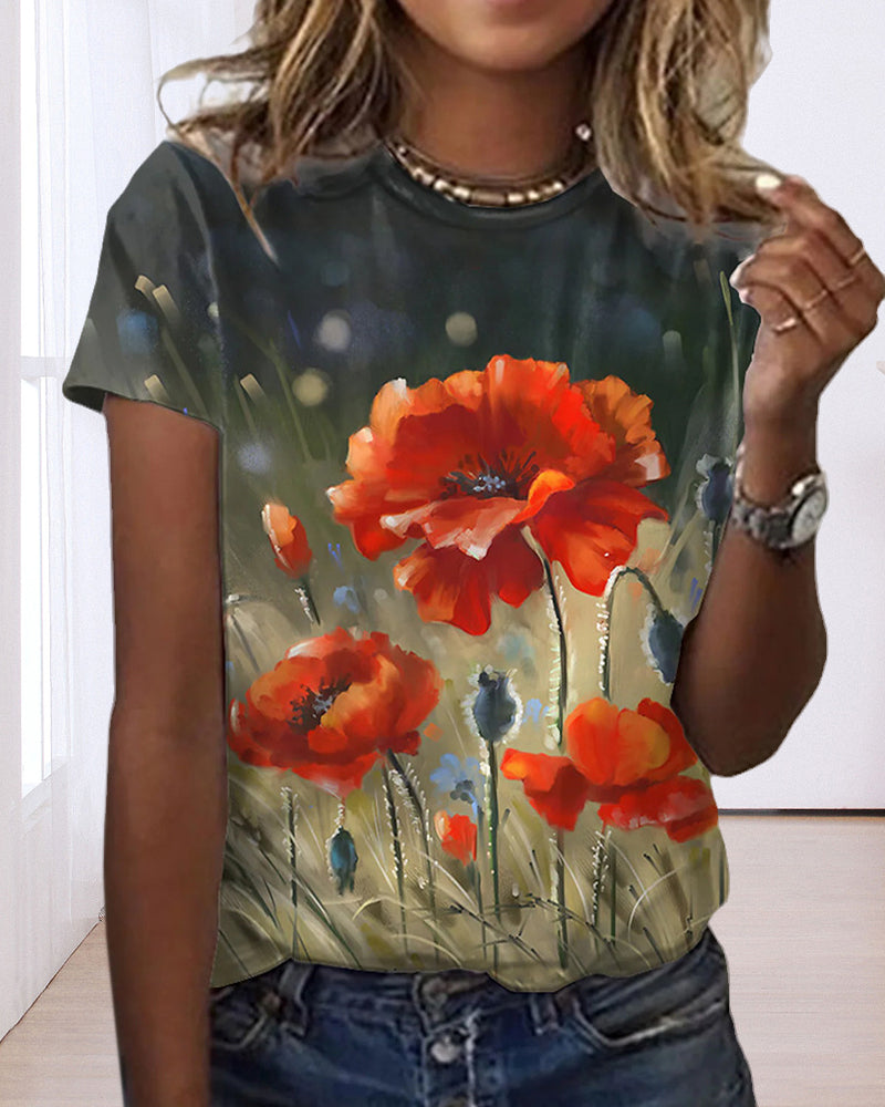 T-shirt i blommönster med rund hals och kort ärm