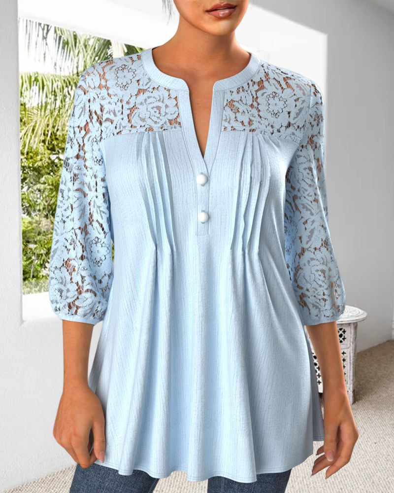 Blus med instickssöm och delad hals