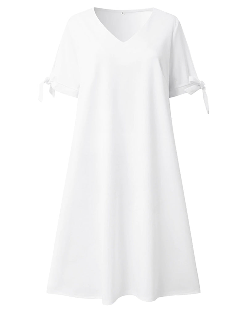 Elegant klänning med delad ärm